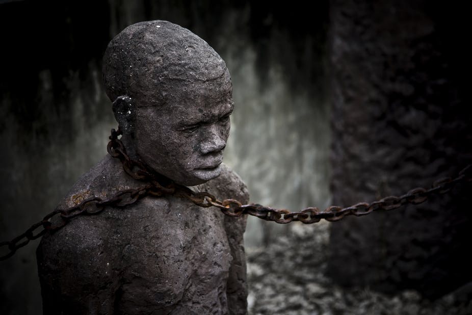 Slave statue in chains
